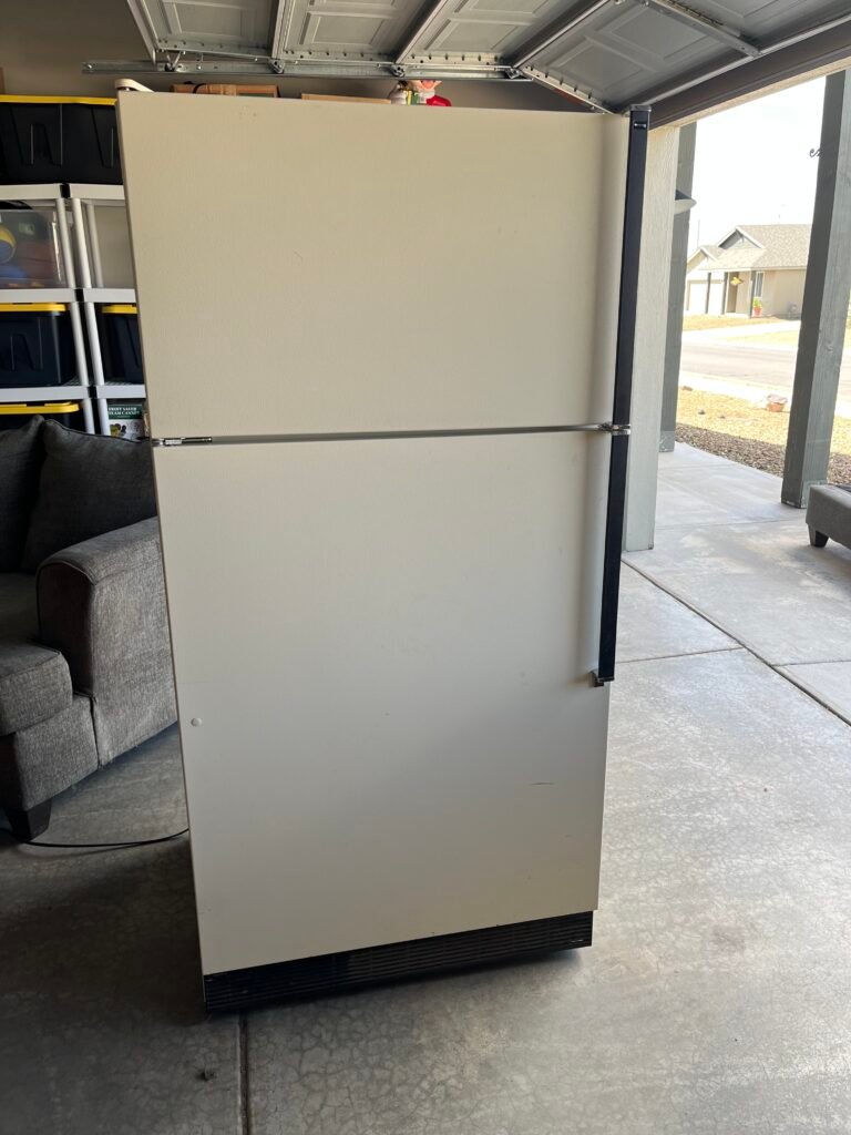 Refrigerator removal: loaded and ready to haul