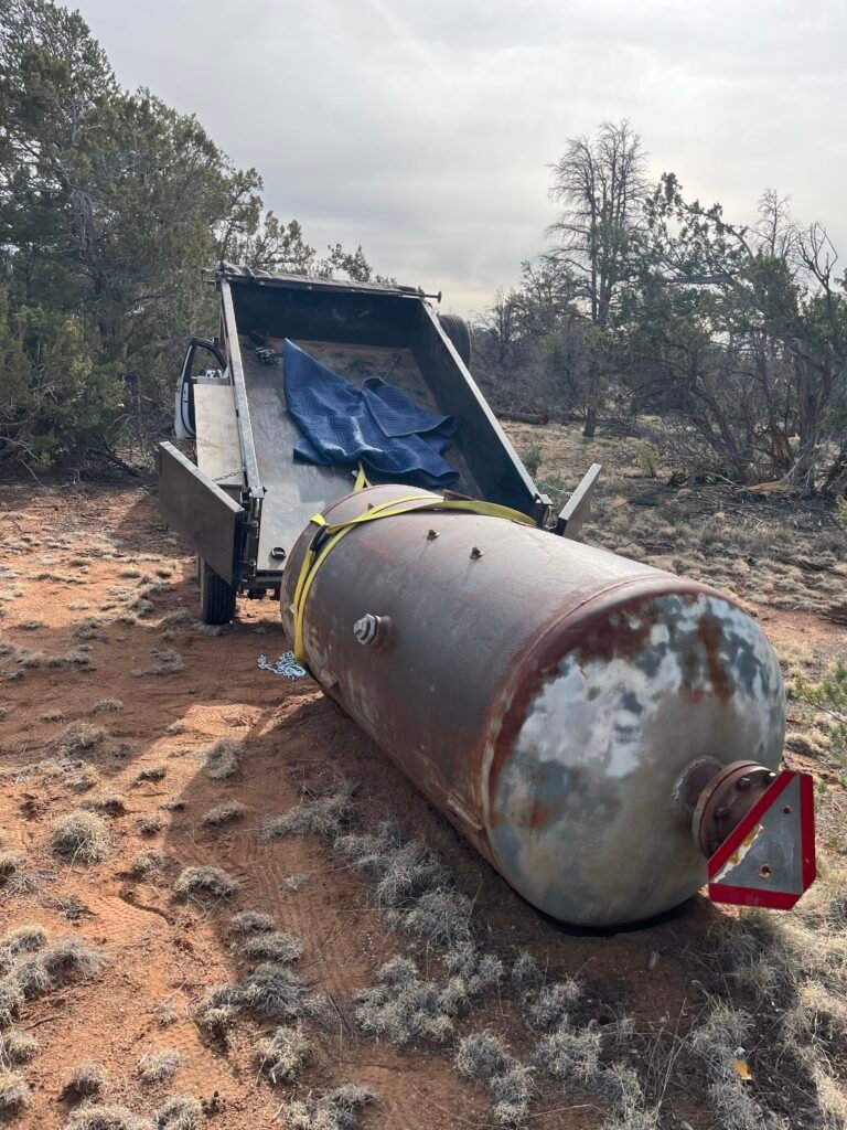 Dumpster rental in Parks AZ: dump trailer on a rural property